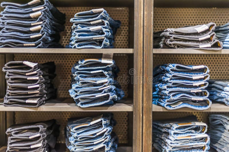 Clothing Products on the Shelf in a Clothing Store Editorial ...