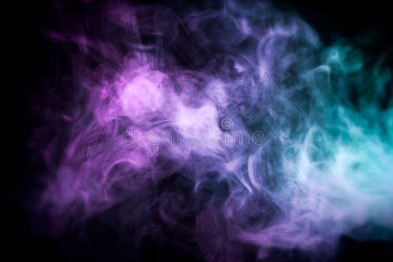Cloud of blue and pink smoke on a black isolated background. Background from the smoke of vape