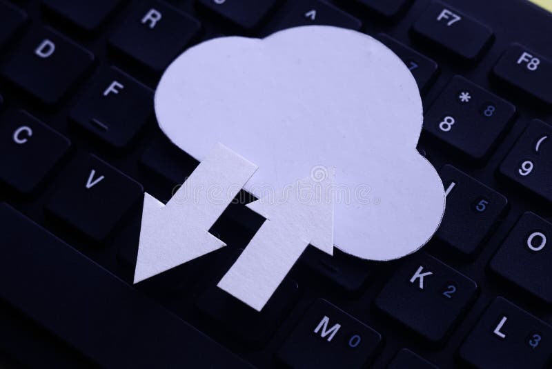 Cloud computing data storage concept. Network computing technologies. Digital server. Icon of cloud with arrow on computer keyboard stock images