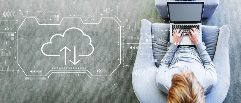 Cloud computing with man using a laptop stock photography