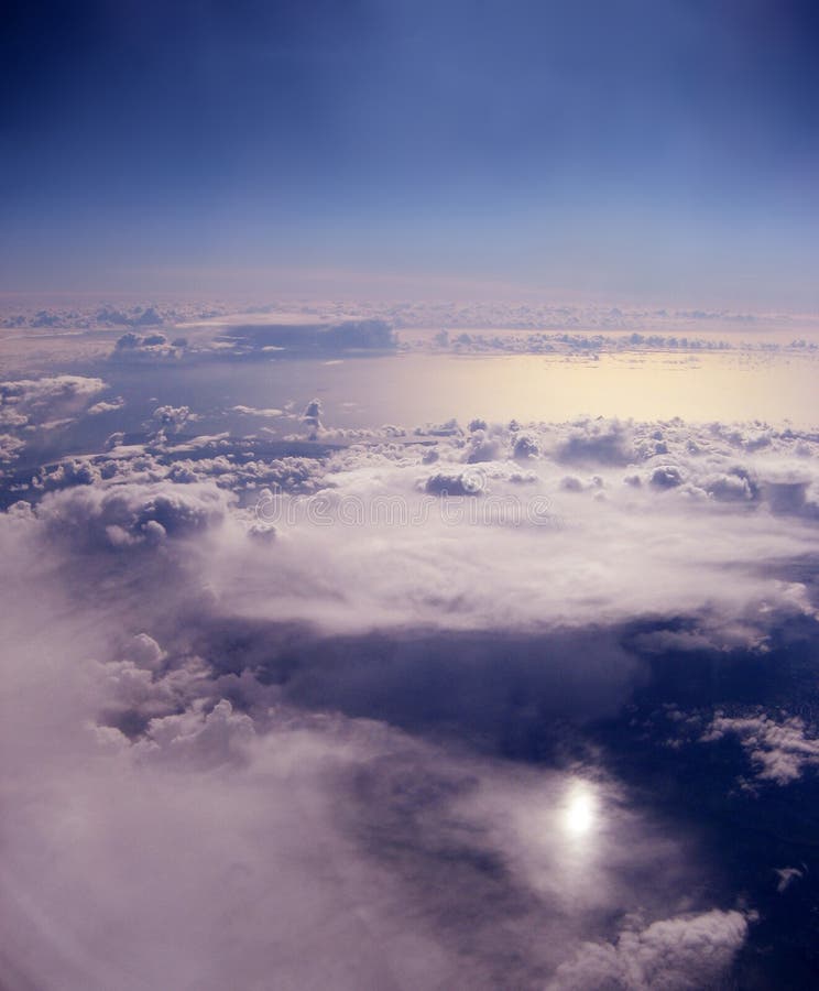 Clouds hovering the ocean, as the light glistens off the water. Clouds hovering the ocean, as the light glistens off the water.