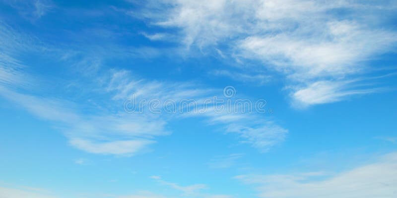 Clouds in the blue sky stock photography