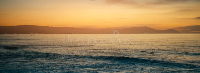 Clouds blue sky and gold sunlight sunset on horizon ocean, background seascape dramatic atmosphere rays sunrise. Relax view waves stock images Clouds blue sky and gold sunlight sunset on horizon ocean, background seascape dramatic atmosphere rays sunrise. Relax view waves stock images