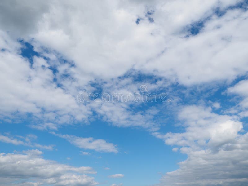 Clouds in the Blue Sky. Sky Screensaver or Background Stock Image