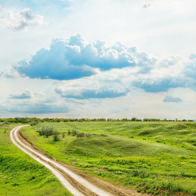 Clouds and Green Meadow with Road Stock Image Image of scene, nature