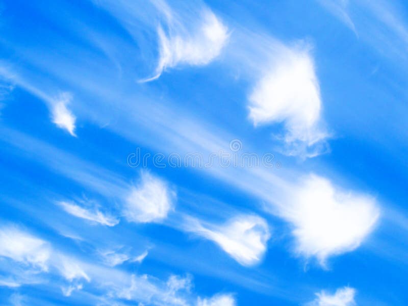 Clouds of hearts angels on a blue background