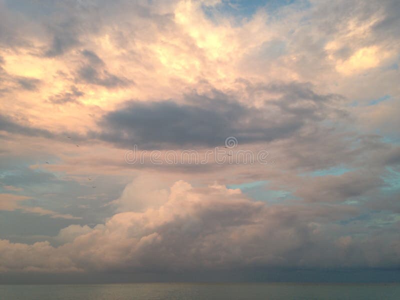 Clouds on Ocean Skyline during Sunset at South Beach, Miami.