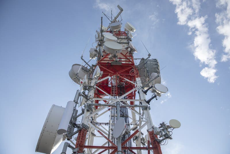 Clouds passing radio tower. Clouds moving in sky above telecommunications tower
