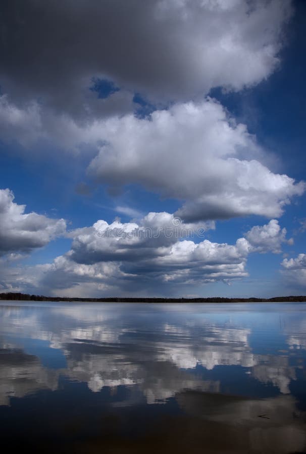 Clouds reflected in water