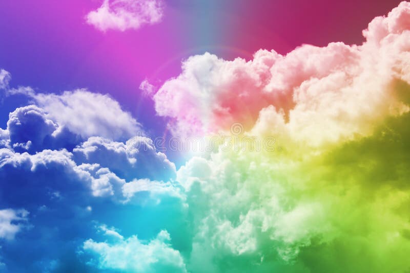 Rainbow colors over the sky covered with clouds. Rainbow colors over the sky covered with clouds
