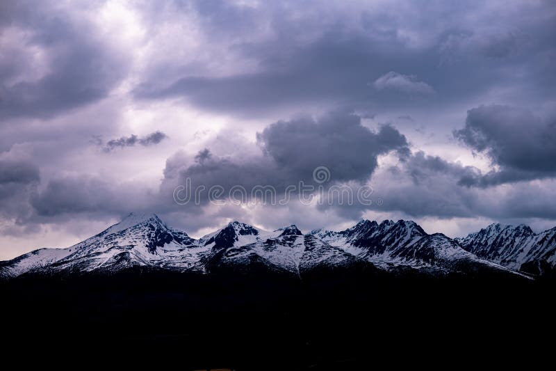 Cloudy winter landscape of the Tatra Mountains. Krivan, Solisko and Satan