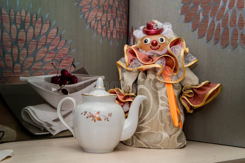 https://thumbs.dreamstime.com/b/clown-beautiful-warmer-teapot-textiles-jewelry-creative-handmade-beautiful-background-clown-warmer-111596887.jpg