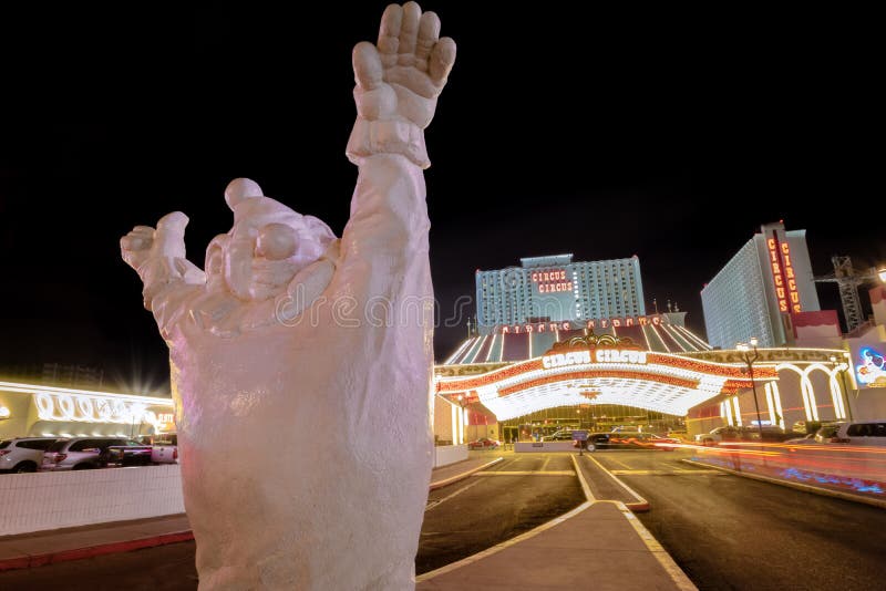 LAS VEGAS, USA - December 23, 2016: Clown at Circus Circus Hotel and Casino entrance at night. LAS VEGAS, USA - December 23, 2016: Clown at Circus Circus Hotel and Casino entrance at night