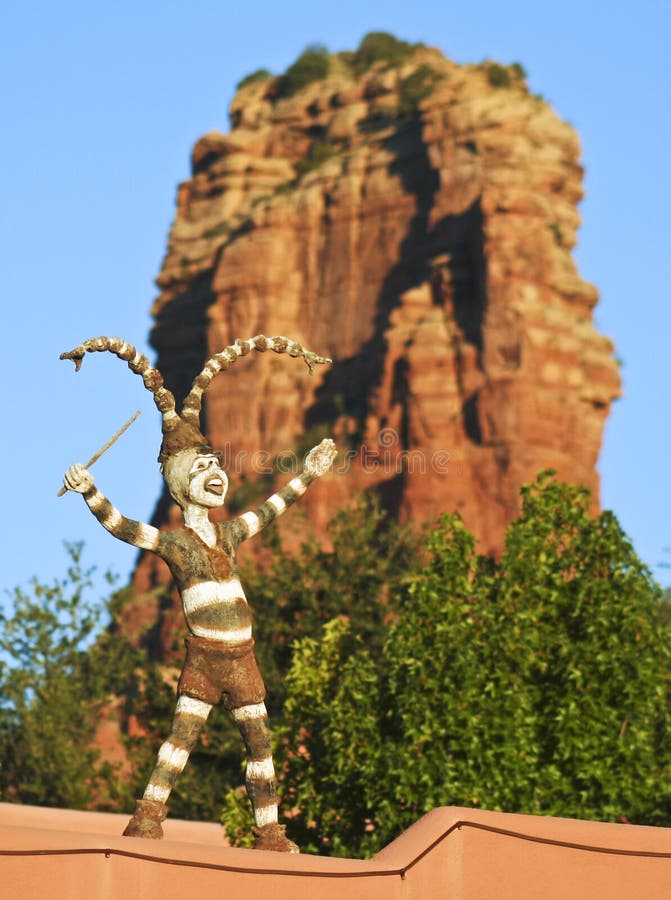 A Clown Dancer and Red Butte Spire