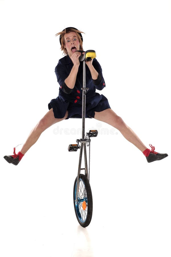 Clown with a unicycle stock photo. Image of male, artist 85023630