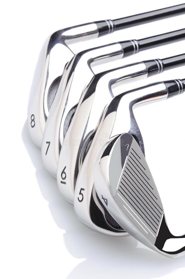 Set of Five Golf Irons on a white background with reflection. Set of Five Golf Irons on a white background with reflection.