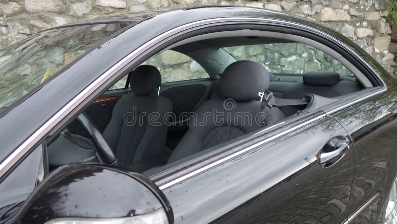 Cluj Napoca/Romania-April 7, 2017: Mercedes Benz W209 Coupe - year 2005, Elegance equipment, inside view, lowered windows stock photos Cluj Napoca/Romania-April 7, 2017: Mercedes Benz W209 Coupe - year 2005, Elegance equipment, inside view, lowered windows stock photos