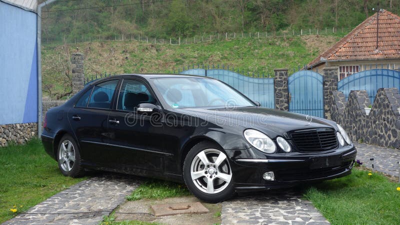 Beautiful Avantgarde Mercedes Benz W211, year 2008, manual transmission,  winter rims, isolated, no people, in an empty parking lot Stock Photo -  Alamy