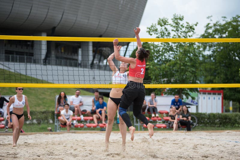 Girl playing beach volleyball