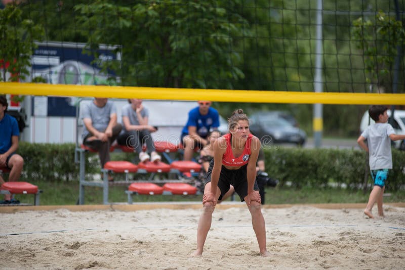 Girl playing beach volleyball