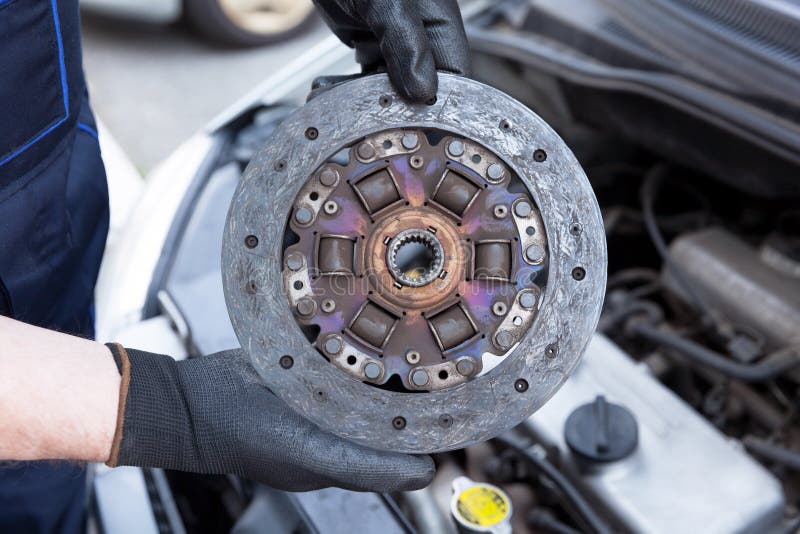 Clutch disc replacement stock image. Image of hand, replacement 106405825
