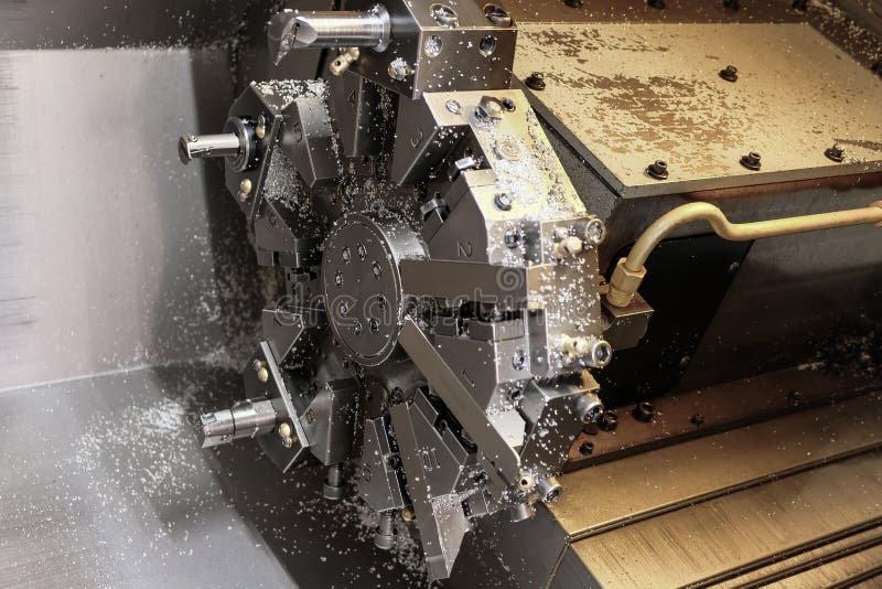 The CNC Lathe Machine. Turning Machine for Drilling with the Drill Tool and Center Drill Tool