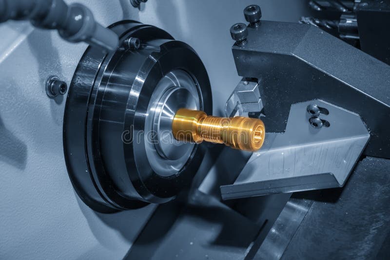 The CNC lathe or turning machine making the tread royalty free stock photos