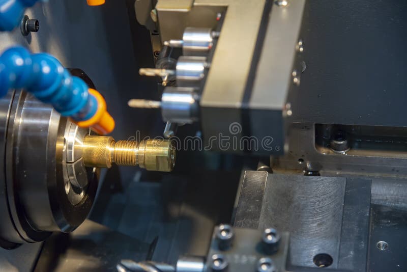 The CNC lathe or turning machine making the tread stock photo