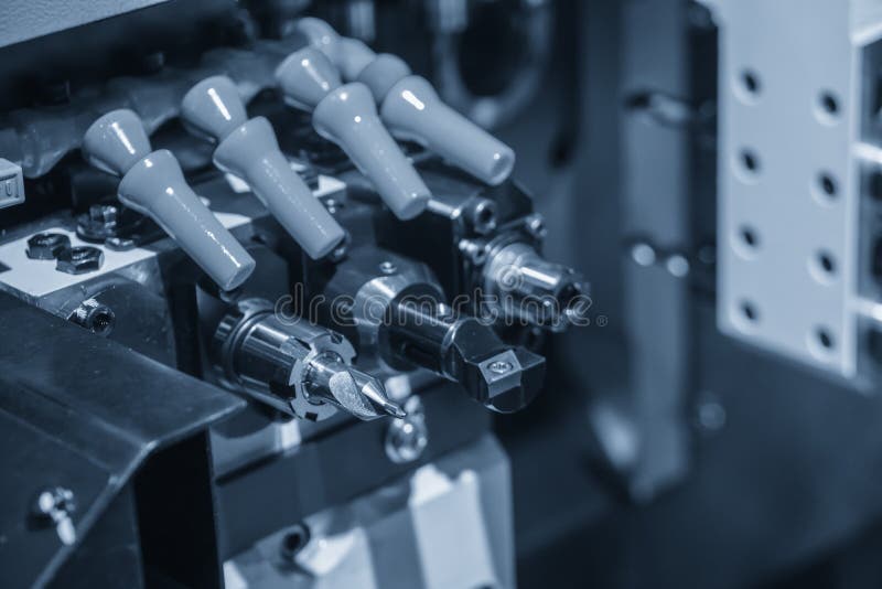 The CNC lathe or turning machine making the tread royalty free stock images