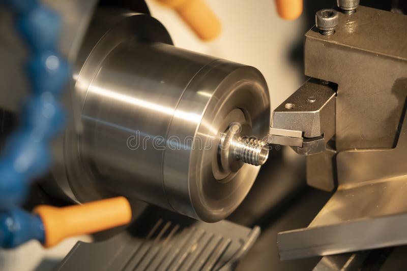 The CNC lathe or turning machine making the tread stock images