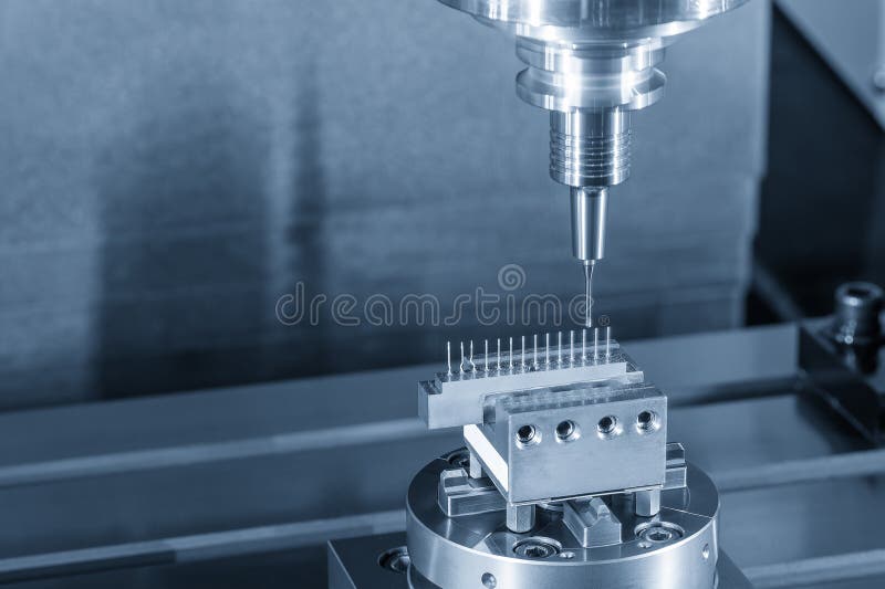 CNC Milling Machine Cutting Copper Electrode with Ball Nose End Mill royalty free stock image