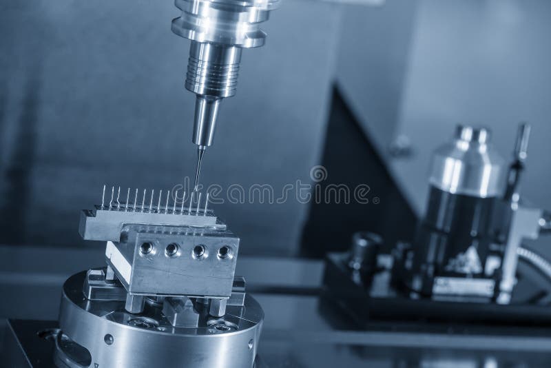 The CNC Milling Machine Cutting the Copper Electrode Parts with Solid Ball End Mill Stock Photo