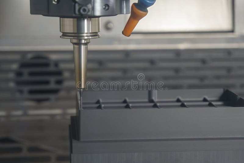 The CNC Milling Machine Cutting the Graphite Electrode Parts with Solid