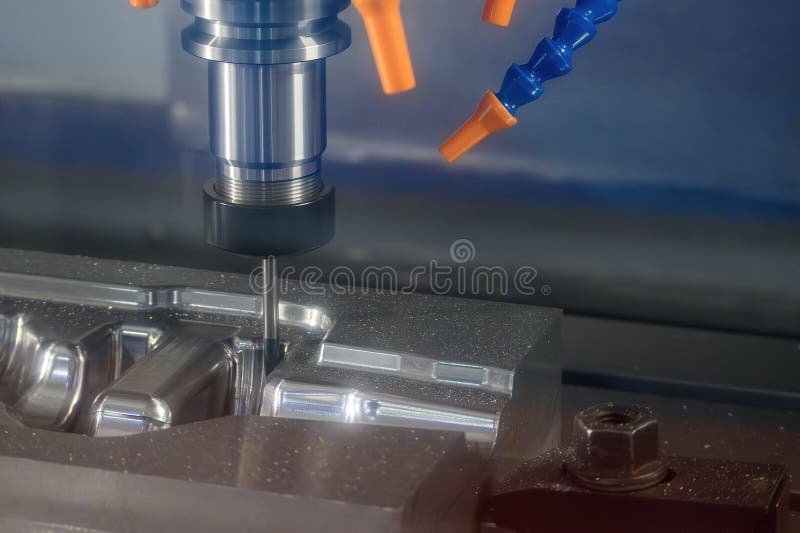 The CNC milling machine finish cut the mold parts by solid ball nose end mill tool royalty free stock image