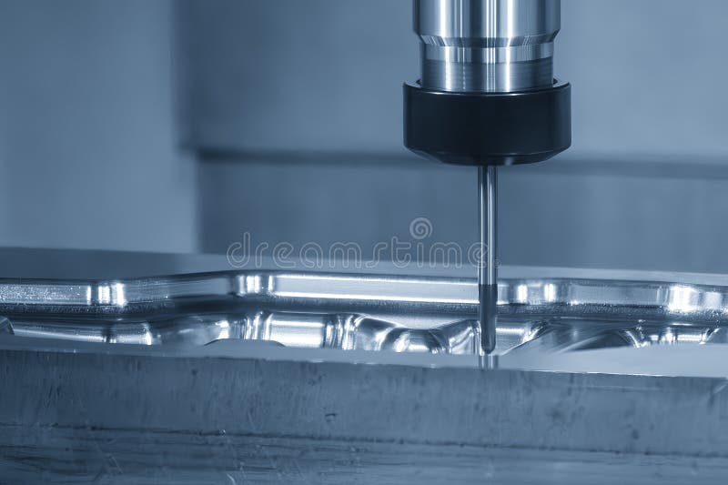 CNC Milling Machine Finish Cutting Forging Mold with Ball Nose End Mill royalty free stock photos