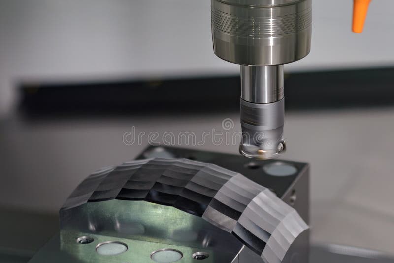 The CNC milling machine rough cutting the mold parts by indexable tools royalty free stock image