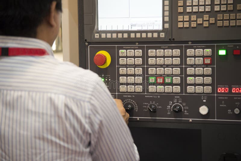 The CNC operator operate the CNC machine. The operator push the keyboard.