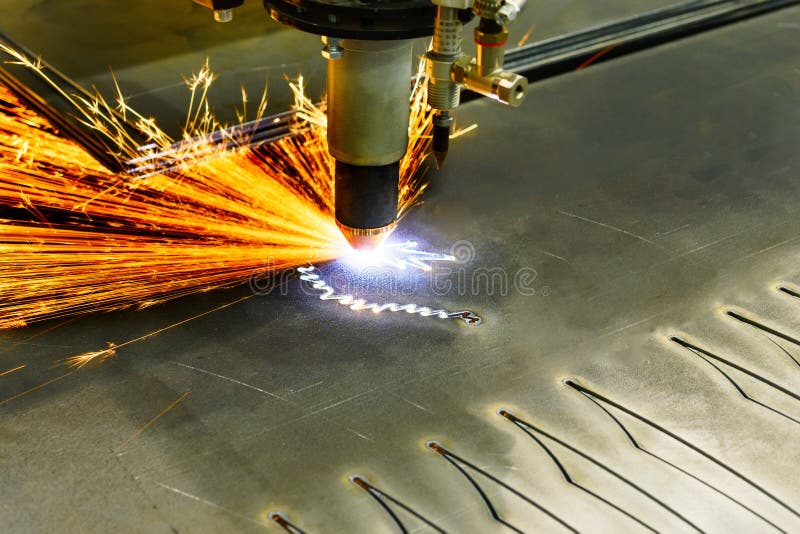 CNC plasma cutting machine during operation. Processing of the steel sheet. Closeup machine tool stock images, royalty-free photos and pictures