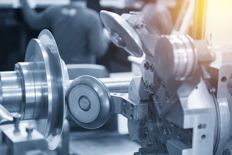 The CNC spinning machine forming the part with light blue scene. Closeup machine tool stock images, royalty-free photos and pictures