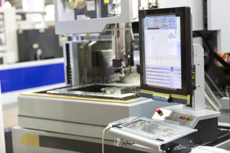 CNC wire cut machine cutting mold parts stock image