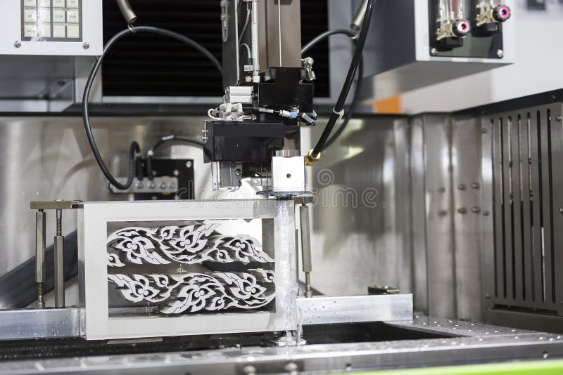 CNC wire cut machine cutting mold parts royalty free stock image