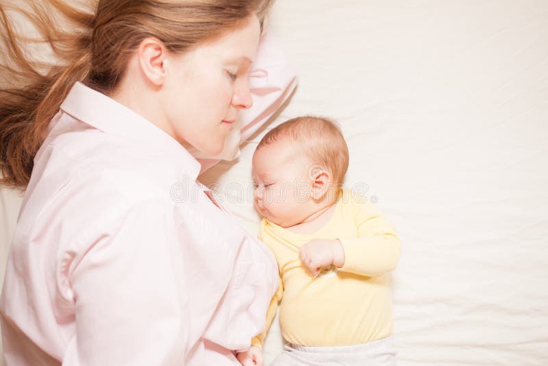 Mother Breastfeeding Newborn Baby in White Bed Stock Photo Image of