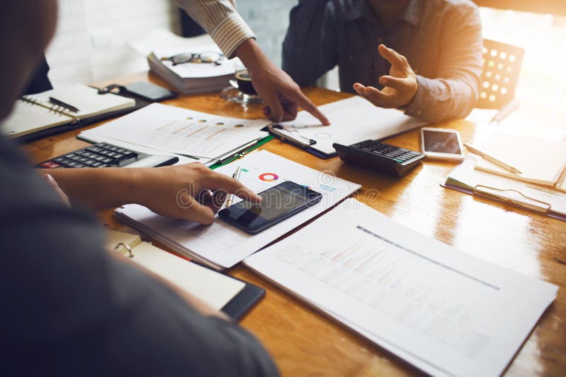 Co-workers are consultants on business documents, tax royalty free stock photos Co-workers are consultants on business documents, tax royalty free stock photos