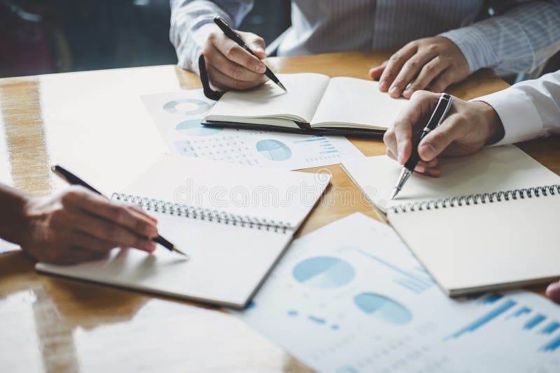 Co working conference, Business team meeting present discussing working analysis with financial data and marketing growth report royalty free stock image