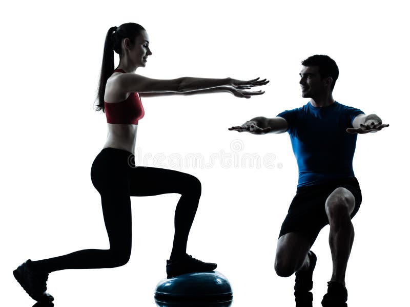 Coach man woman exercising squats on bosu royalty free stock photo