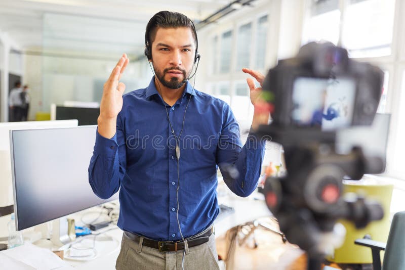 Coach Recording Instructional Video for Streaming Stock Photo Image