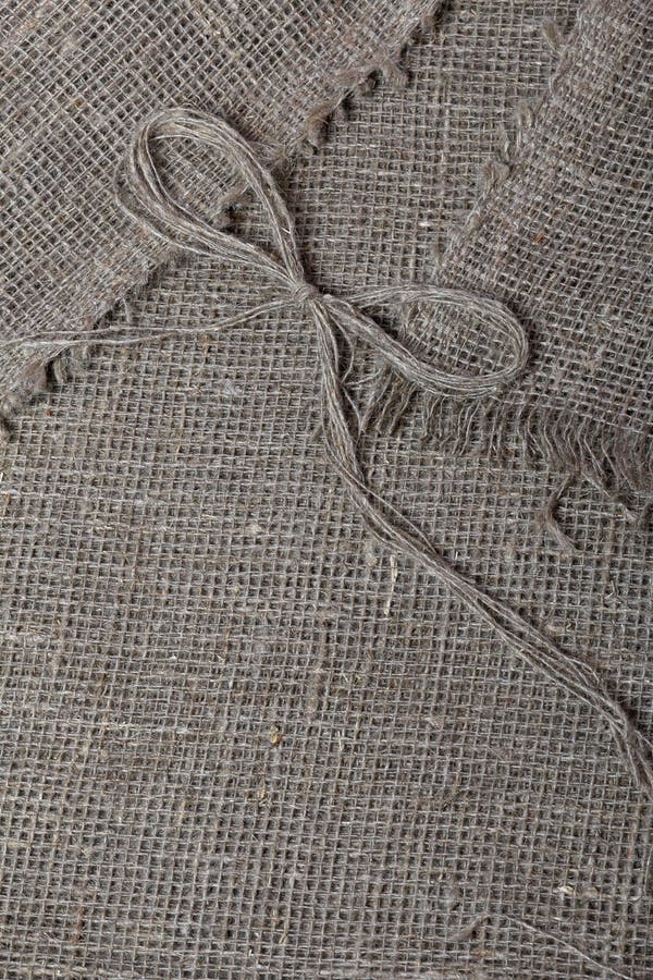 Coarse Linen Fabric. on it Lies a Bow of Linen Thread Stock Image ...
