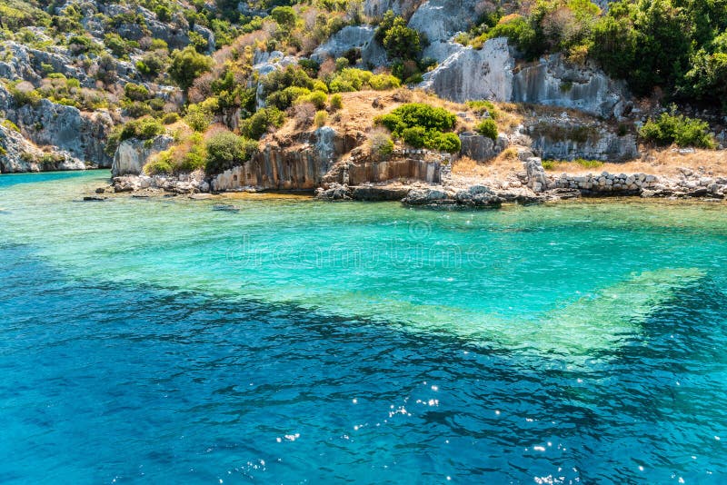 Coast of Kekova island with visible underwater structures of the Sunken City, in Antalya Province of Turkey