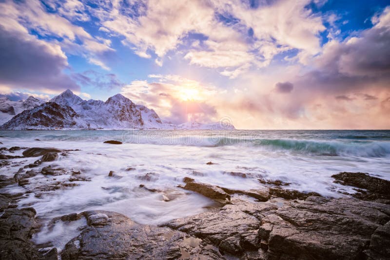 Coast of Norwegian sea on rocky coast in fjord on sunset royalty free stock photos Coast of Norwegian sea on rocky coast in fjord on sunset royalty free stock photos