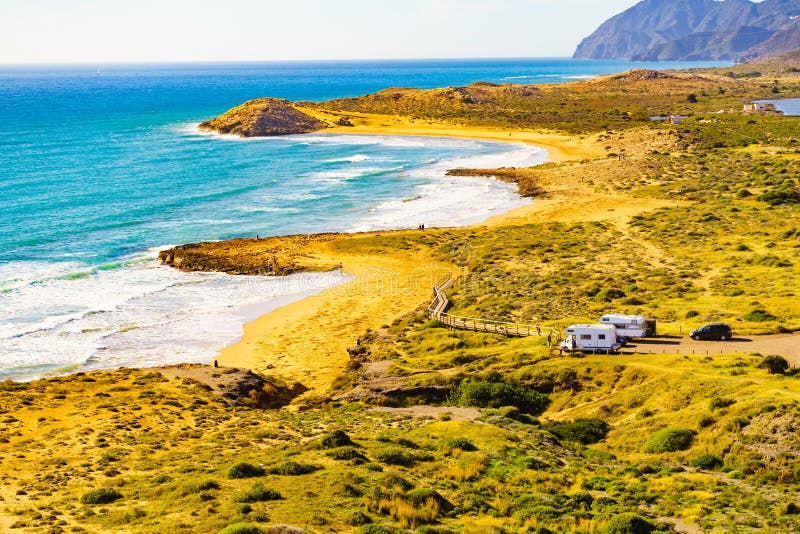 Coast view with camper rv camping on sea shore, Spain